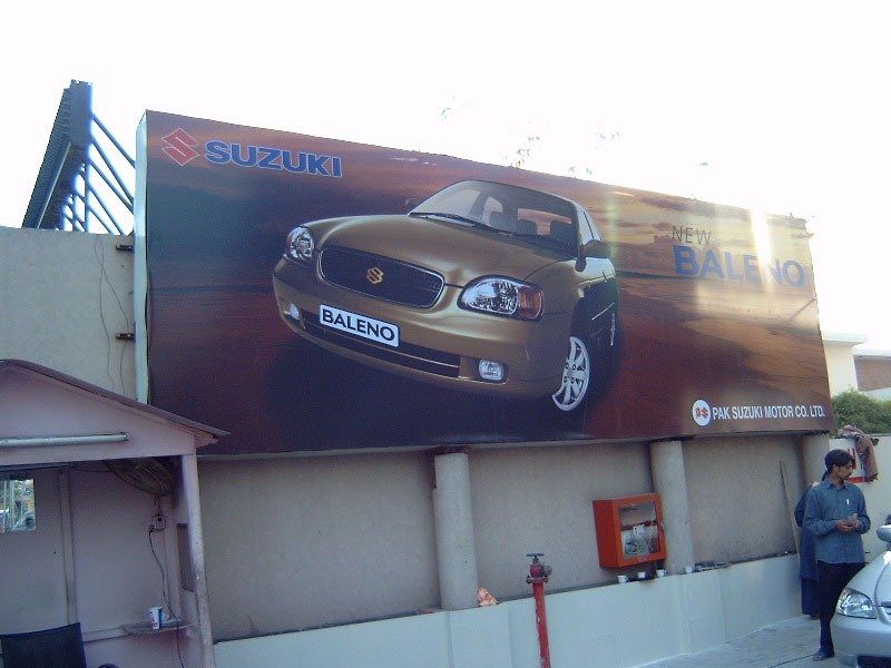 Colorful hoarding board design for shop attracting foot traffic in a local market