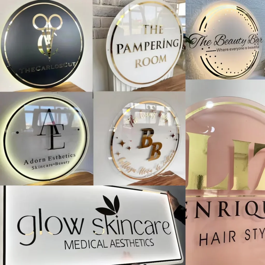 A collection of custom acrylic sign boards with gold and clear finishes illuminated by backlighting for a premium look.