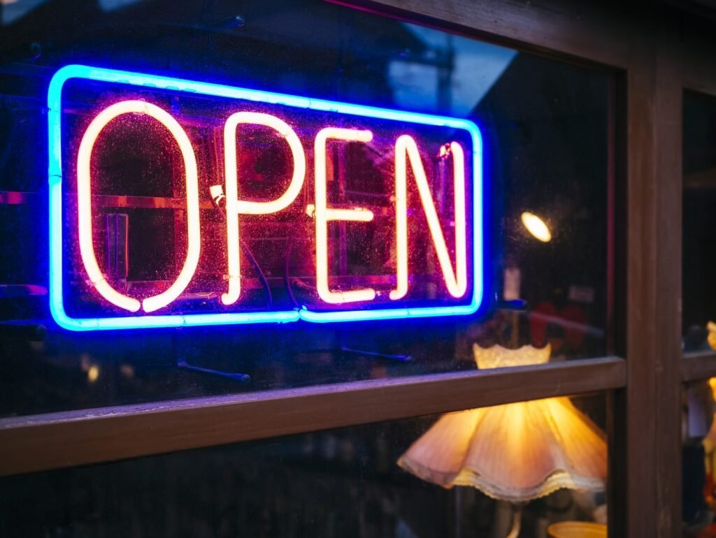 Collection of illuminated advertising neon vector elements—represents variety and creativity in neon signs for marketing.