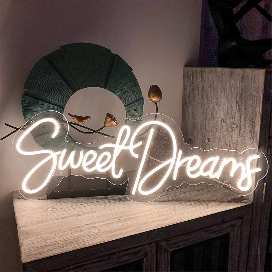 Coffee First acrylic neon signs with gold backboard glowing in warm white LED