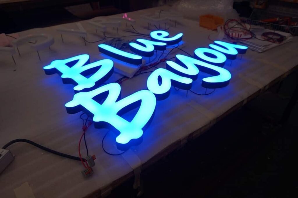 Custom acrylic box neon signs with stylized lettering and neon heart decoration