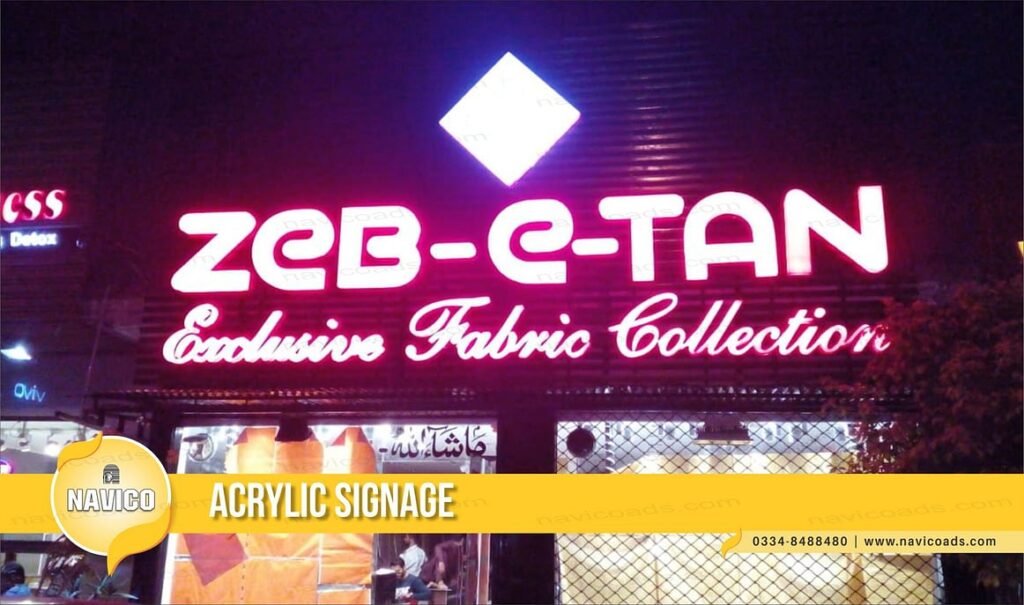 “Front lit 3D Acrylic Sign Board glowing at night with metallic letters and sleek design